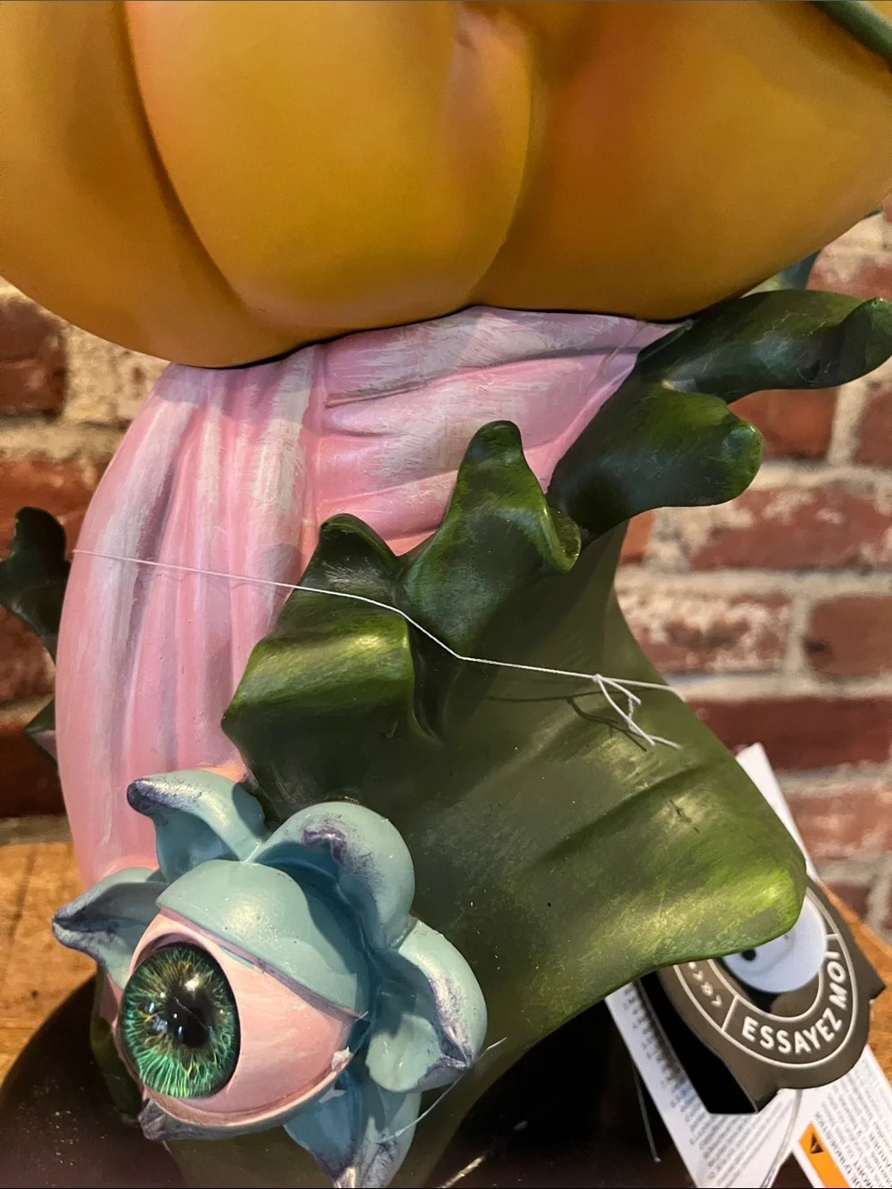 Whimsical Orange Pumpkin Figurine with Pink Accent